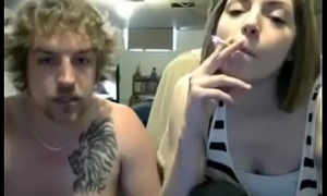 teen couple engulfing fingering smokin' on webcam